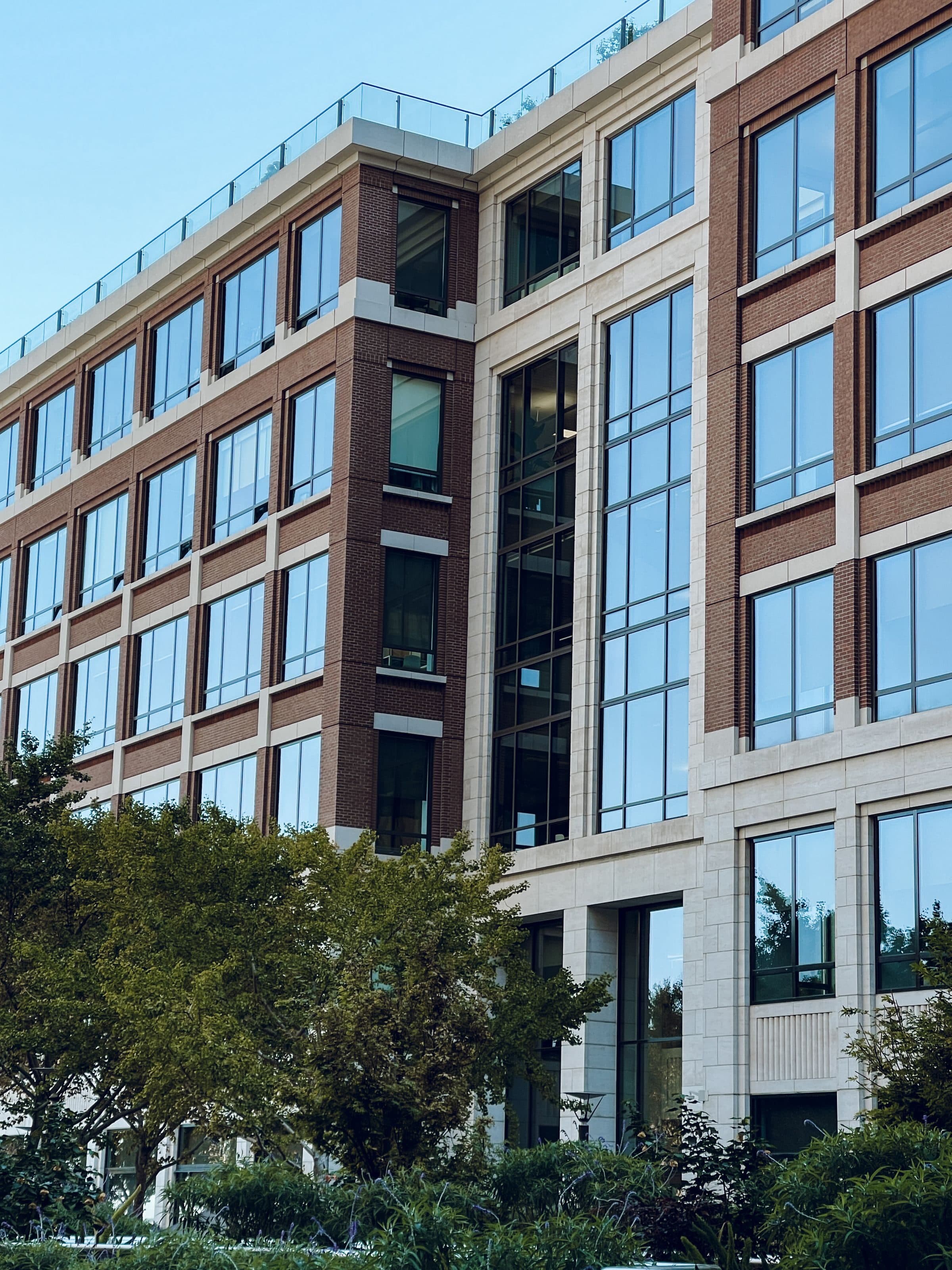 A brick and glass office building, the kind of commercial building a commercial property policy insures
