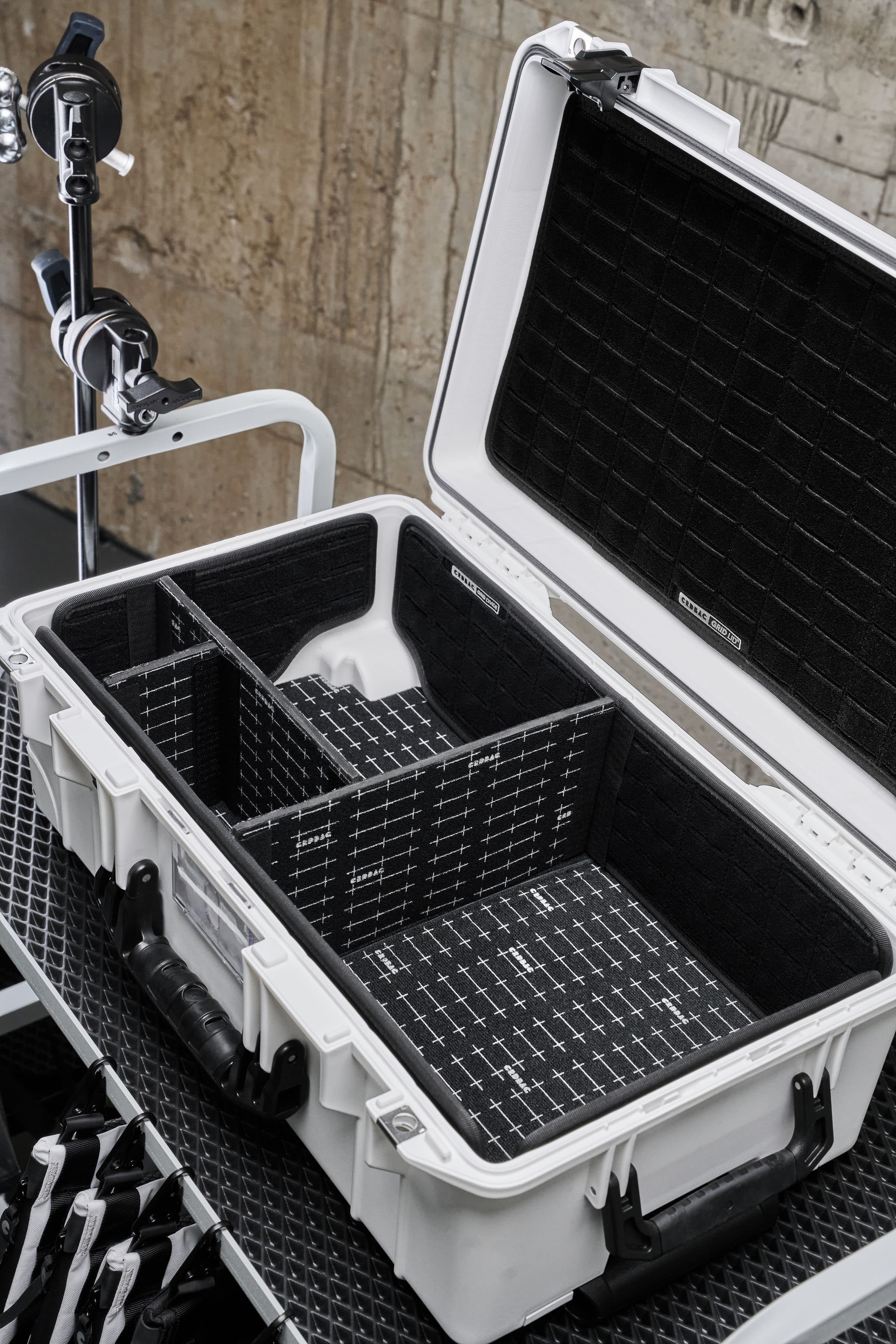 An open equipment case on a job site, tools and gear inland marine insurance covers away from the premises