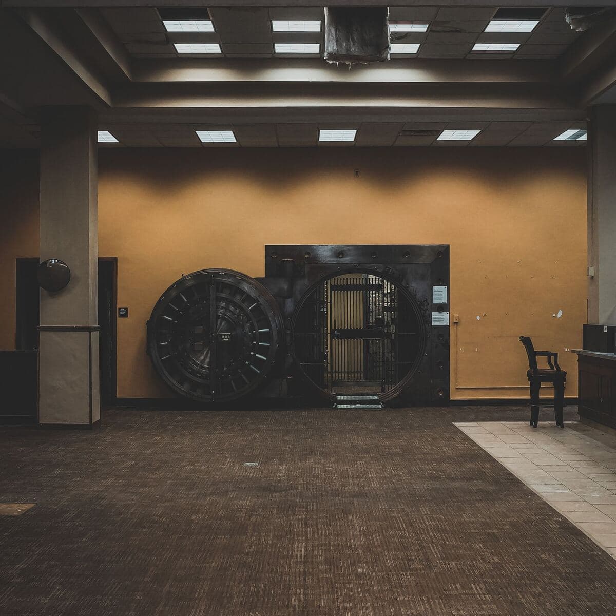 The open vault door of a bank