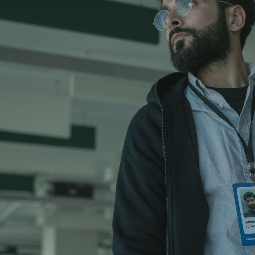 An employee wearing an ID badge on a lanyard