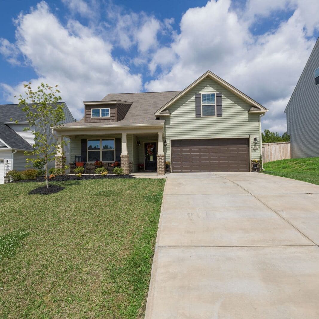 A family house with a lawn and a driveway, a California home insured with the FAIR Plan and a DIC policy