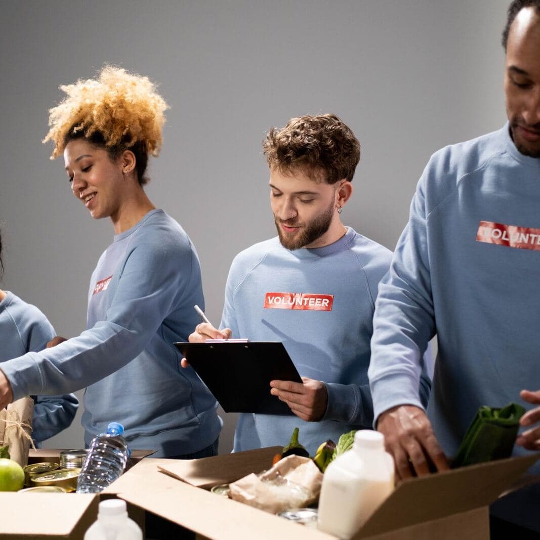 Volunteers packing donation boxes
