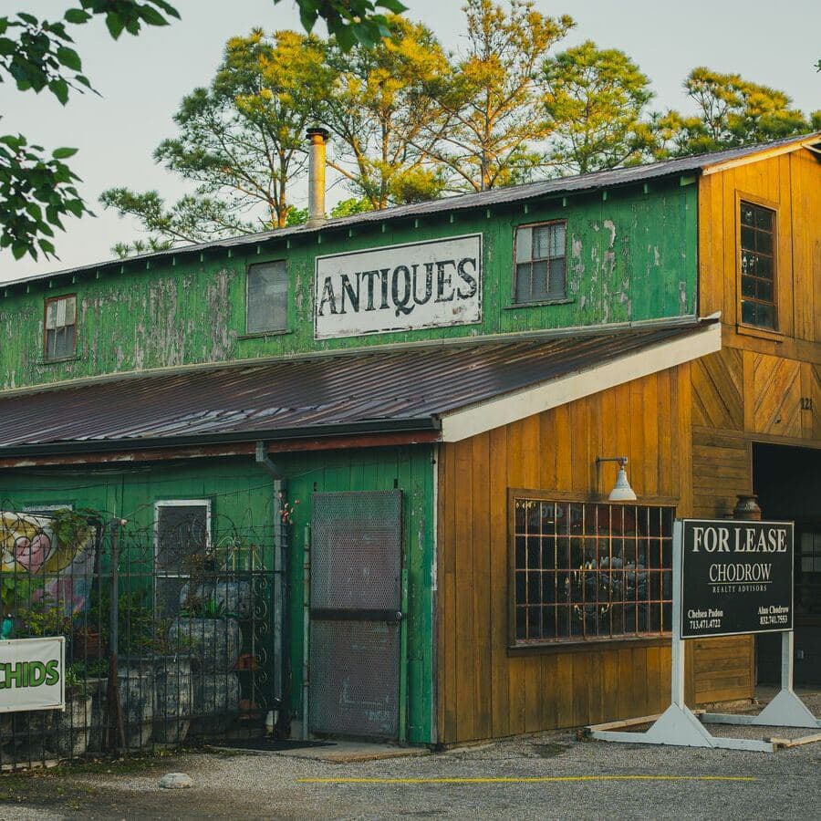 An old storefront with a for lease sign, a vacant commercial building insured for property and liability between tenants